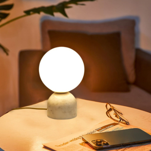 Small lamp. Big mood. Our marble-base globe lamps blend warm light with solid elegance — perfect for any space craving calm and character.